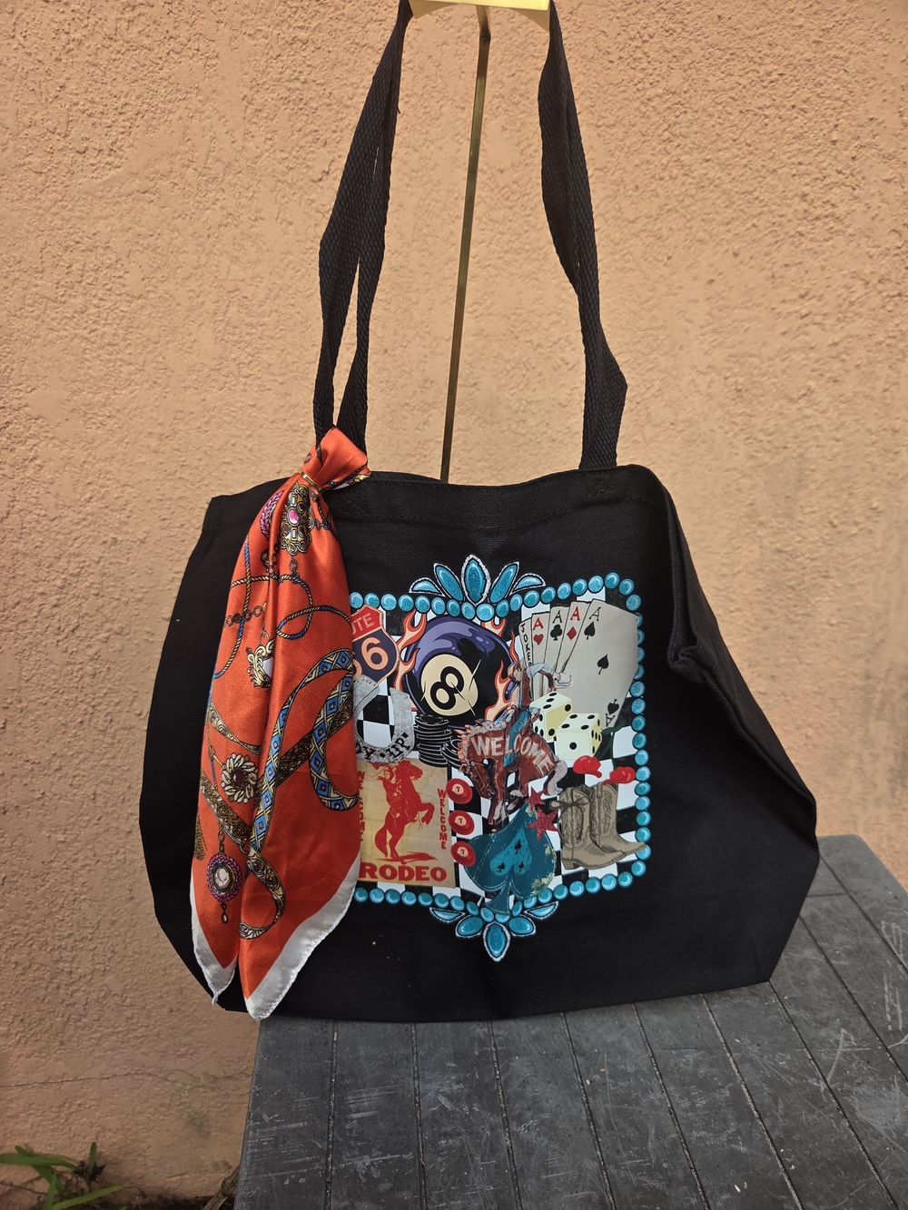 Black Canvas Tote Bag with Blue Embellished Graphic and Orange Scarf